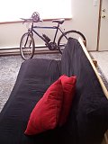 My bike via the futon. 